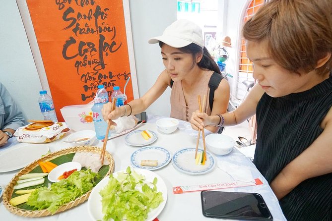 Evening Walking Food Tour, folk game and lantern boat - The Old Town walk: why evening lanes change the food experience