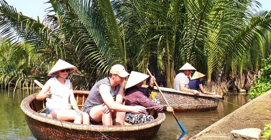 Experience Bamboo Basket Boat on Coconut village w Locals - Bay Mau Coconut Forest: hats, paddling, and the boat spin