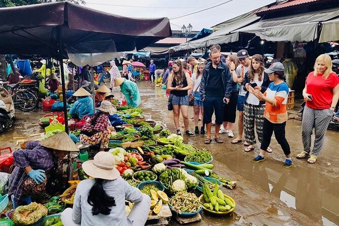 Experience Local Market and Boat Ride with Cooking Class - Guide One and the energy that turns it into fun