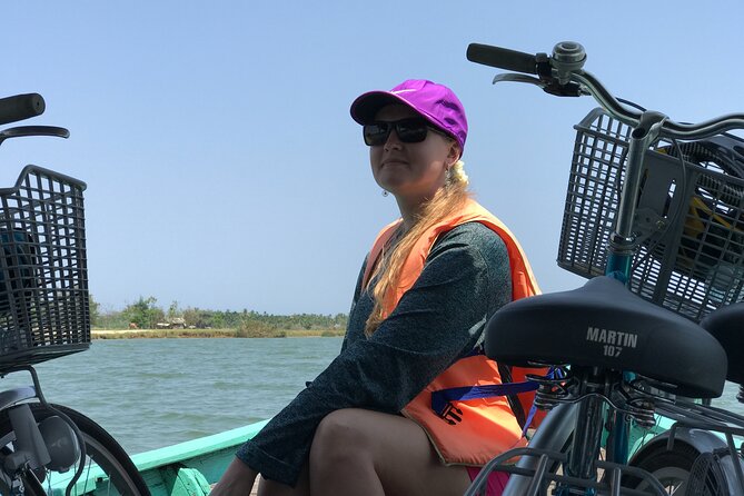 Half-Day Hoi An Countryside and Villages Tour by Bike - Cam Kim Island: buffalo fields, rice wine, and sedge mat weaving
