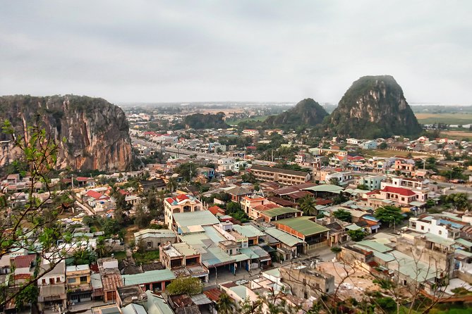 Half day Marble Mountain and Linh Ung Pagoda Tour - Climbing Marble Mountains: caves, sanctuaries, and the 156 steps