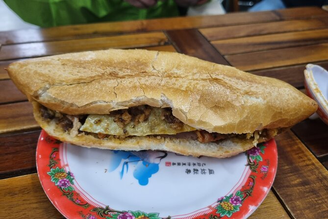 Half-day Private Street Food Tour in Hoi An - Stop 2: BIDV ATM and the optional balut challenge