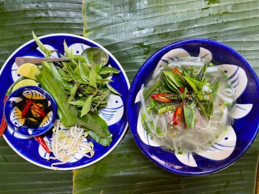 Hoi An: Cooking Class, Local Market & Basket Boat Experience - Cooking class that actually results in four dishes