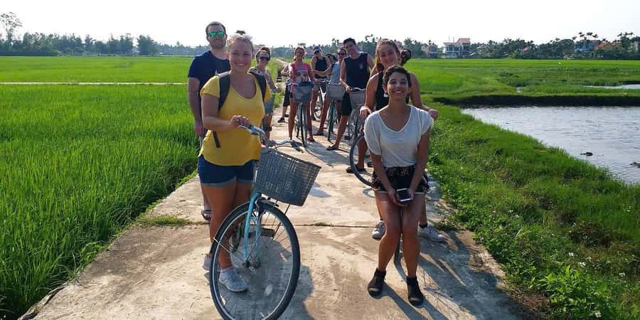 Hoi An: Countryside Bicycle Tour with Farm, Basket Boat Ride - Meeting farmers and getting hands-on with buffalo life