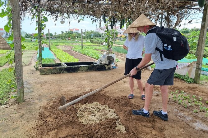 Hoi An Countryside Tour By Scooter With Lady Bikers - Tra Que Vegetable Village: gardening time and lotus tea