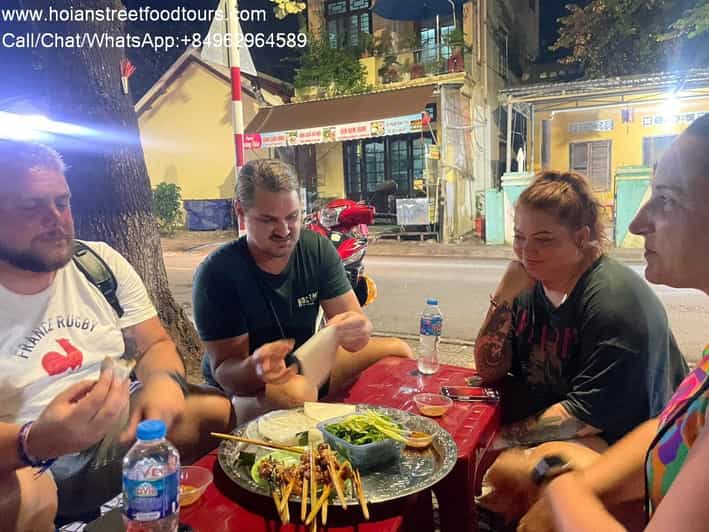 Hoi an food tour with 8 different street food tasting - Quang noodles: shrimp, pork, peanuts, herbs, and flavorful broth