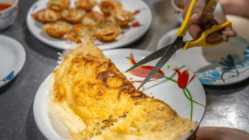 Hoi An: Private Evening Food Tour by Bike - River-side barbecue with views of the historic quarter