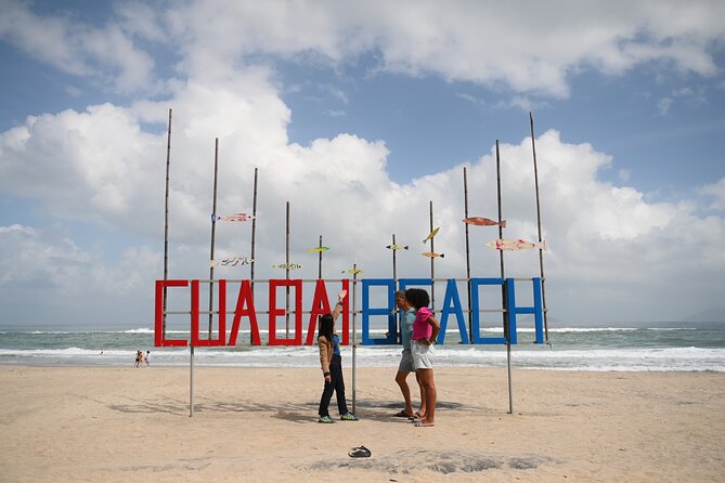 HoiAnGO Experience Local Life: Coastal by Electric Car - Cua Dai Beach: short rest on sand that used to be bigger