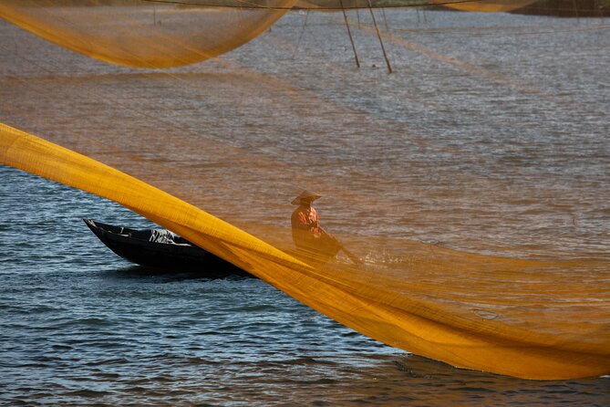 Photography Tour Hoi An Fishing Nets - Why net repair is a photo win in Hoi An