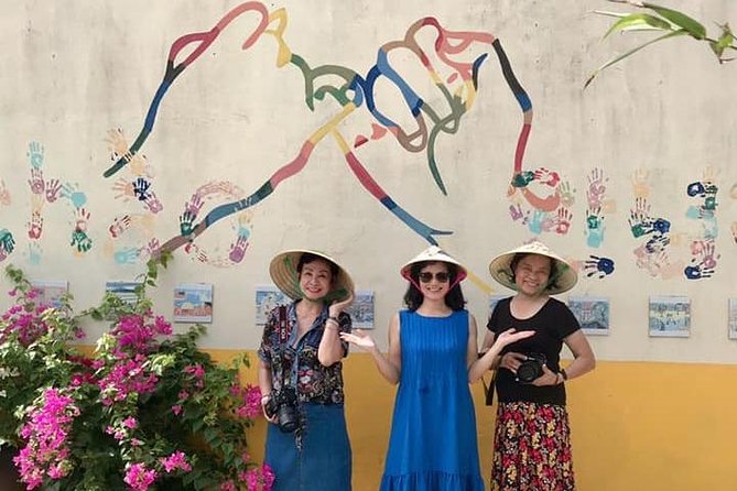 Visiting Tam Thanh mural village - Mother Thu monument - Stop 2: Bich Hoa Tam Thanh village murals on house walls